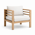 Fauteuil en bois avec coussins en lin blanc